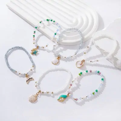 Pulsera Cristal Perla Dije Oceano X12